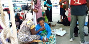 Red Cross officials tending to injured residents at the Likoni Ferry Channel on July 21, 2020.