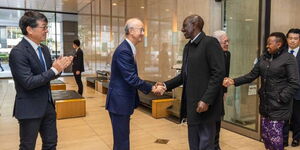 President William Ruto greets an official of the Toyota Tsusho Corporation in Japan on February 6, 2024.