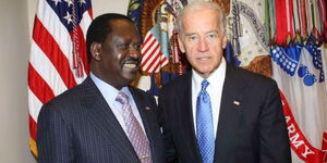US President Joe Biden (right) poses for a photo with Azimio Leader Raila Odinga (left) during a past event.