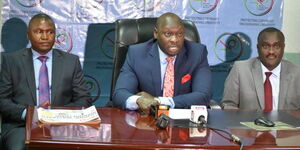 Photo of Kenya Copyright Board Chief Executive Officer, Joshua Kutuny (centre) in a press briefing on November 8, 2023