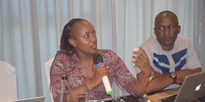 Journalists Chemutai Goin (left) and Duncan Khaemba (right) during a parliamentary committee meeting on Friday, April 14, 2023.