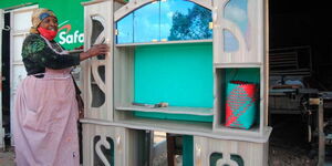 A file image of Julia Njeri at her workshop in Molo town, Nakuru County.