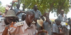 Juma Nyasi is carried shoulder high by his fellow inmates at Manyani Maximum Security Prison during the celebration of his KCPE performance.