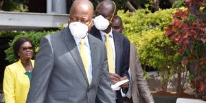 Health CS Mutahi Kagwe (front) with Ministry of Health director-general Dr. Patrick Amoth at a press briefing on April 2, 2020. 