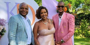 Lang'ata Member of Parliament Phelix Odiwuor alias Jalang'o posing for a photo with radio personality Kameme Goro and her husband David Pyper at their wedding on April 20, 2023.