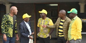 Muranga Senator Irungu Kanga'ata together with Deputy President William Ruto engaged in a conversation with other UDA-affiliated leaders at a past event.