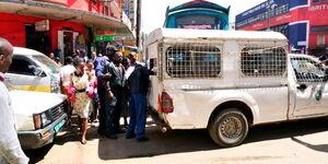 Nairobi County askaris during an operation to arrest traders violating by-laws on Ronald Ngala Street in Nairobi