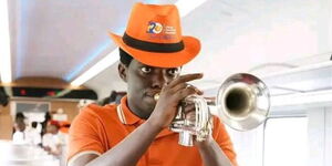 ODM Youth League Member Kasmuel McOure blowing a trumpet inside a train on Thursday, November 13, 2025.