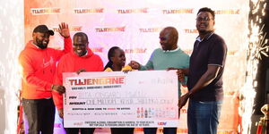 (From Right to Left) Christopher Onyango, Arthur Mwamvura, Rita Ongaro, Amos Kiguru, and Samuel Maina. Rita Ongaro won Ksh1 million in the ongoing Tujengane National Consumer Promotion. 