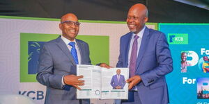 KCB Group CEO Paul Russo (Right) and Group Finance Director Lawrence Kimathi (Left) during the announcement of the bank's 2024 Q1 financial results 