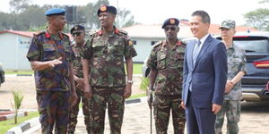 Chinese Ambassador to Kenya Mr Liu Xianfa (Right) and officials from the Kenya Defence Forces on Wednesday, April 26, 2023. 