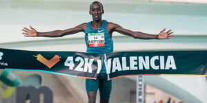 Kelvin Kiptum crosses the finishing line during the Valencia Marathon held in Spain on December 4, 2022.