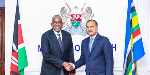 Health Cabinet Secretary Aden Duale(left) shaking hands with India’s High Commissioner Dr Adarsh Swaika on Tuesday, December 9, 2025