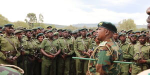 Chief Conservator of Forests adressing a group of Kenya Forest Srrvice officers o