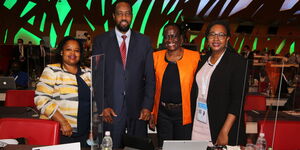 The Principal Secretary for Broadcasting and Telecommunications Ms. Esther Koimett together with other delagates