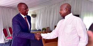 Kenyan President William Ruto greets his Ugandan counterpart Yoweri Museveni.