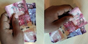 A photo of a person holding Kenyan money worth Ksh150.