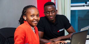 Kenyans.co.ke employees pose for a photo at the company's offices in Westlands, Nairobi in January 2024. 