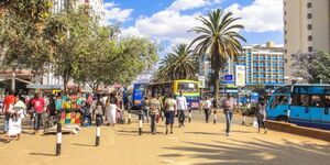 Kenyans stroll along Nairobi streets.