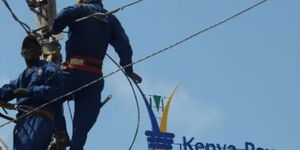 Kenya power workers fixing electricity supply lines