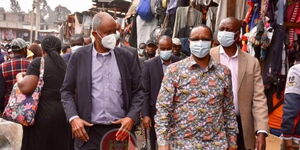 Kamukunji MP Yusuf Hassan and Interior PS Karanja Kibicho (R) at Gikomba on Friday, August 6.