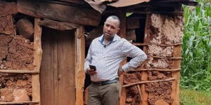 Kameme FM radio presenter, Muthee Kiengei, poses for a photo in Ngamwa kìnurì village, Nyeri County. 