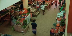 Traders selling goods at Kikuyu Market in Kiambu County