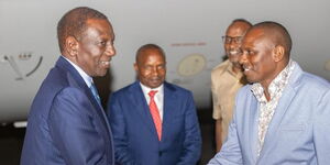 National Assembly Majority Leader Kimani Ichung'wah (right) receives President William Ruto at JKIA on May 17, 2024. 