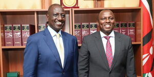 President William Ruto (left) and Member of Parliament Kimani Ichung'wa  in Parliament on November 9, 2023