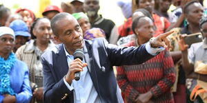 Kiambu Governor Kimani Wamatangi addressing residents during the distribution of certified seeds on April 14, 2023