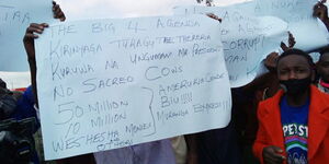 Placards carried by demonstrators in Kutus town on Thursday, June 9, 2020, against Governor Anne Waiguru.
