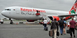 Passengers ready to board a Kenya Airways plane at Jomo Kenyatta International Airport.