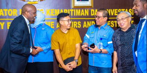 Trade and Investment CS Moses Kuria (left) chats with Indonesian government officials after the meeting in Jakarta Indonesia on May, 9, 2023.