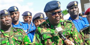 Deputy Inspector General Eliud Lagat addressing media at a past event.