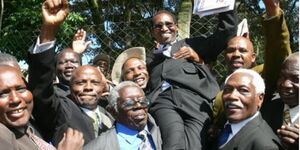 A file photo of lawyer Dominic Kimata is carried shoulder high by retired teachers outside Nakuru law courts. 