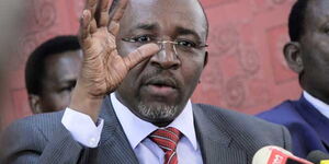 A photo of Meru Senator Mithika Linturi gesturing during a past press address at Parliament Buildings. 