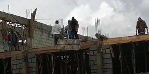 Workers removing materials from Kesses Sub-county hospital that was under construction.