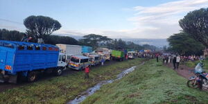 A traffic snarl-up along the Mai Mahiu - Narok Road after heavy downpour resulted in floods which deposited debris on the highway on April28, 2024
