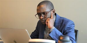 Kenyans.co.ke digital journalist John Mbati at work