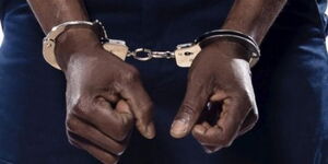 A photo of a Handcuffed man 