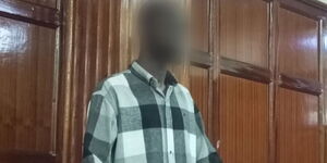 A photo of a man arraigned in Milimani Court on Friday for failing to pay a hotel bill worth Ksh466,000.