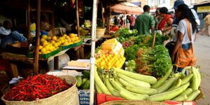 Kenyans purchase food commodities at Fig Tree market in Ngara, Nairobi in 2019