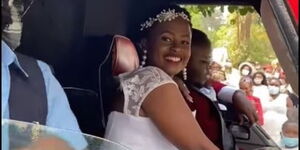Newly DJ Mzito and Brenda arriving at their wedding reception 