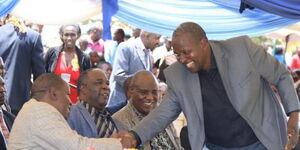 KNUT Treasurer John Matiang'i (standing) greats Interior CS Fred Matiang'i