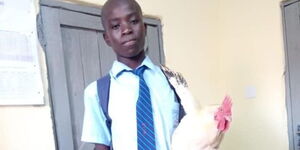 Matthew Simiyu, a student who went with a cockerel to school to pay part of his school fees.
