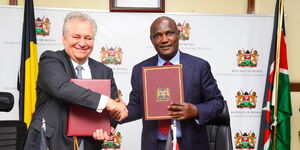 Belgium Ambassador to Kenya, Peter Maddens (left) and Treasury Cabinet Secretary John Mbadi during the signing of the elimination of double taxation agreement on Tuesday, September 30, 2025.