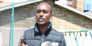 Security expert Mwenda Mbijiwe speaking during a past press briefing.