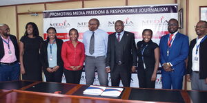 Media Council of Kenya(MCK) members posing for a photo