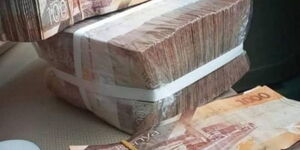 A photo of bundles of cash