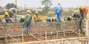 A file image of construction workers at a site in Kenya.